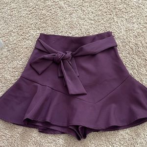 purple skirt with tie bow